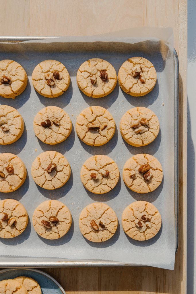 Caramelized Plum Tart: The Dessert That’ll Steal the Spotlight 3 Sliced plums arranged in a spiral on tart dough, ready to be baked into a caramelized plum tart