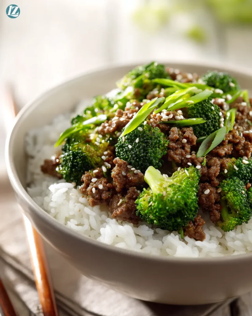 Easy ground beef and broccoli served over rice in bowl