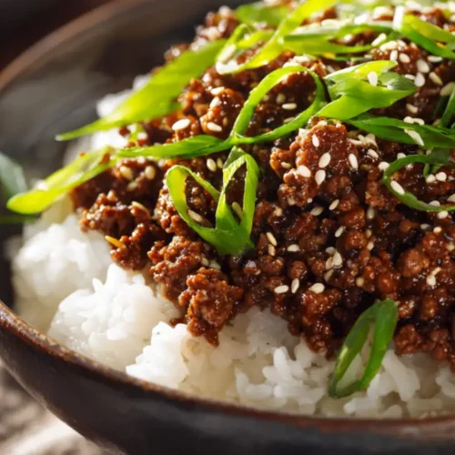 Korean Ground Beef Recipe for Bold, Quick Weeknight Dinners 4 Korean ground beef served over rice with sesame seeds