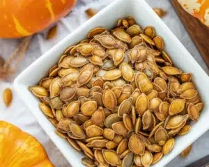 Crispy air fryer pumpkin seeds roasted to perfection in a basket.