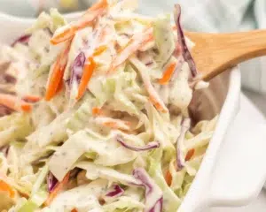Creamy poppyseed coleslaw with fresh vegetables and a tangy dressing