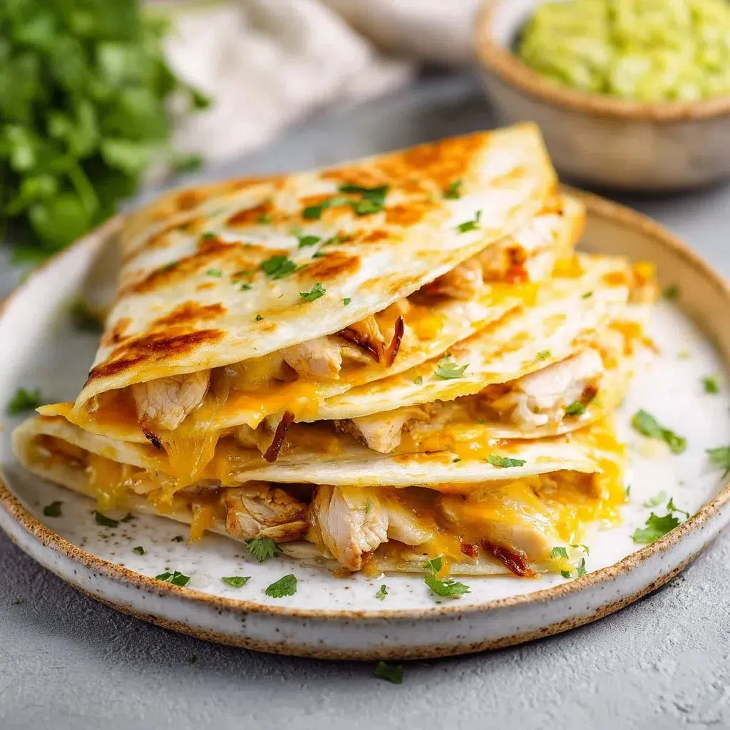 Delicious easy cheesy chicken quesadillas on a plate