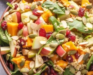 Delicious Harvest Quinoa Salad with butternut squash, apples, and cranberries.