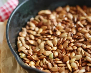 Deliciously crunchy honey roasted pumpkin seeds with a sweet and salty glaze.