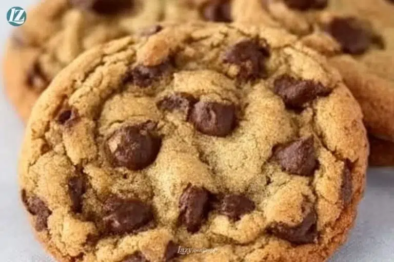 Freshly baked brown butter chocolate chip cookies on a cooling rack