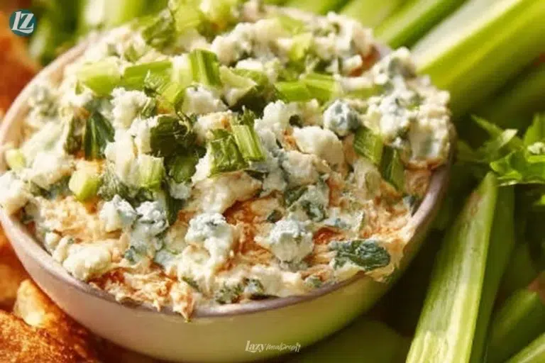 High-protein buffalo chicken salad with fresh vegetables and spicy dressing