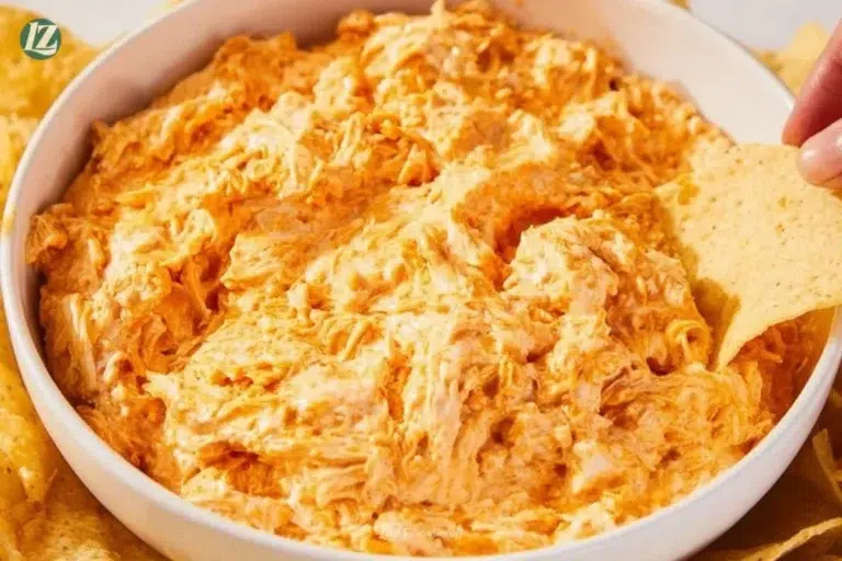 Creamy Buffalo Chicken Dip served in a bowl with tortilla chips