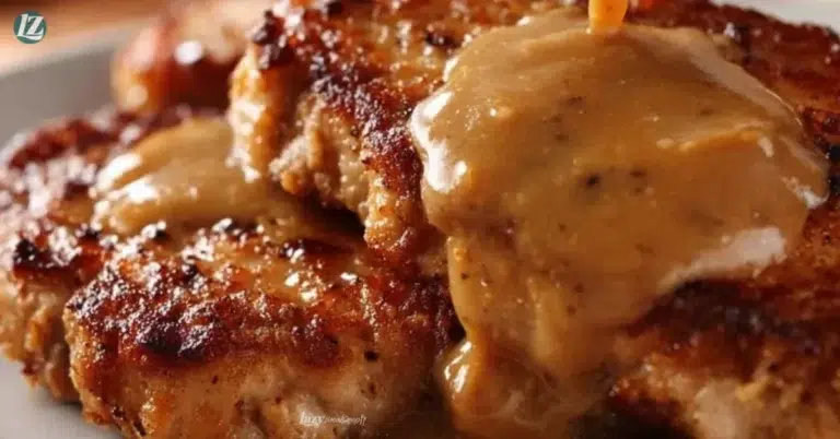 Delicious country fried pork chops served on a rustic plate
