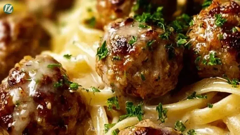 Delicious garlic butter meatballs served over creamy linguine