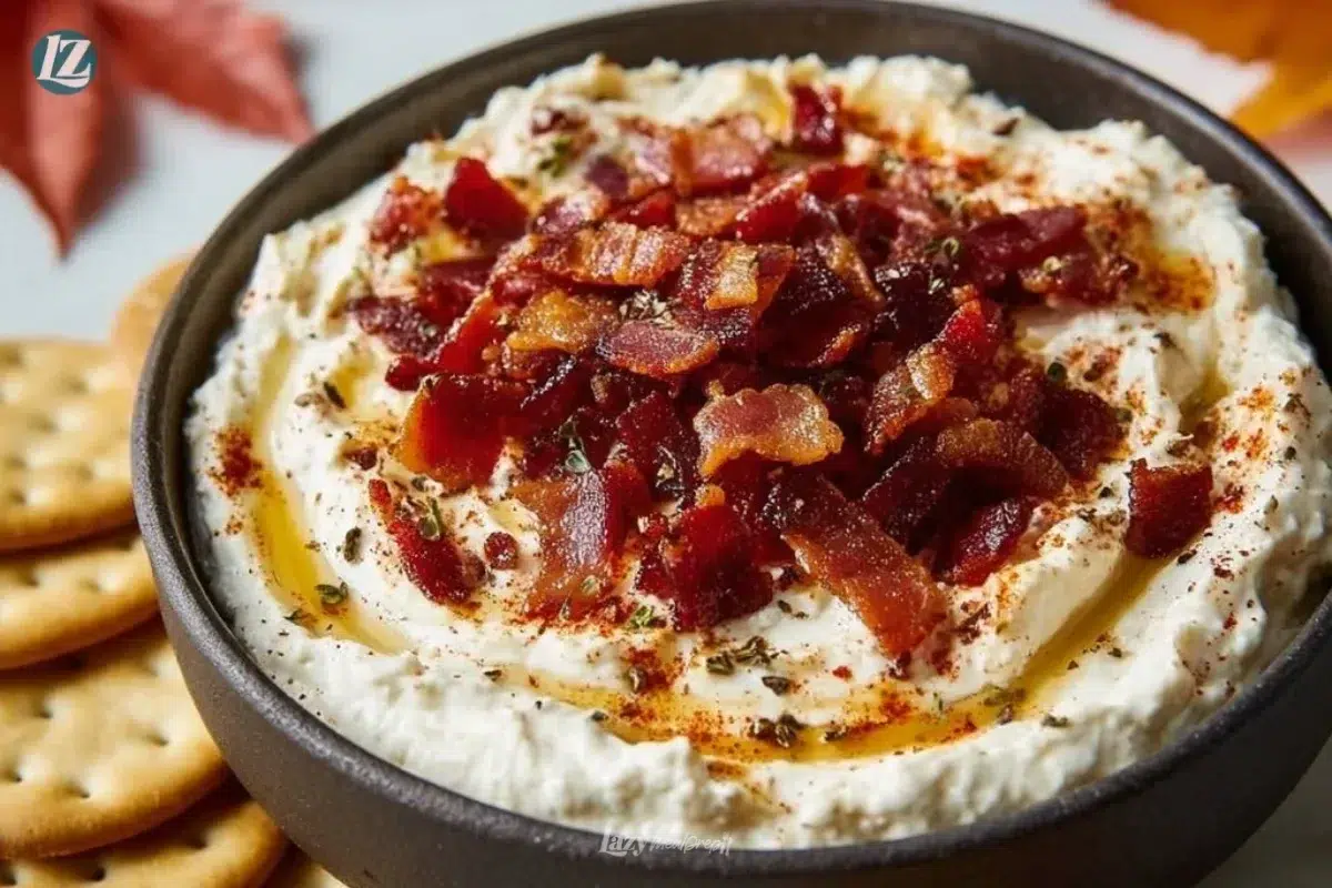Delicious Maple Bacon Cheese Dip served in a bowl with pita chips.
