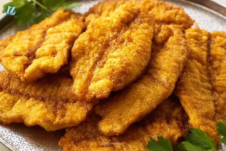 Southern Fried Catfish served with tartar sauce and lemon wedges