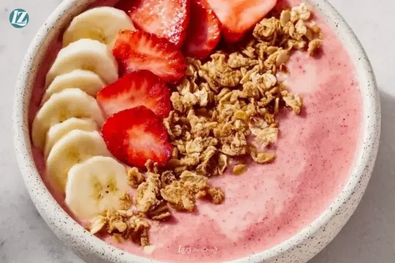 Strawberry Banana Smoothie Bowl topped with fresh fruits and granola