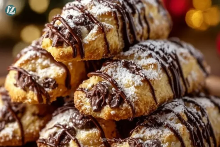 Delicious cannoli cookies on a plate topped with powdered sugar.