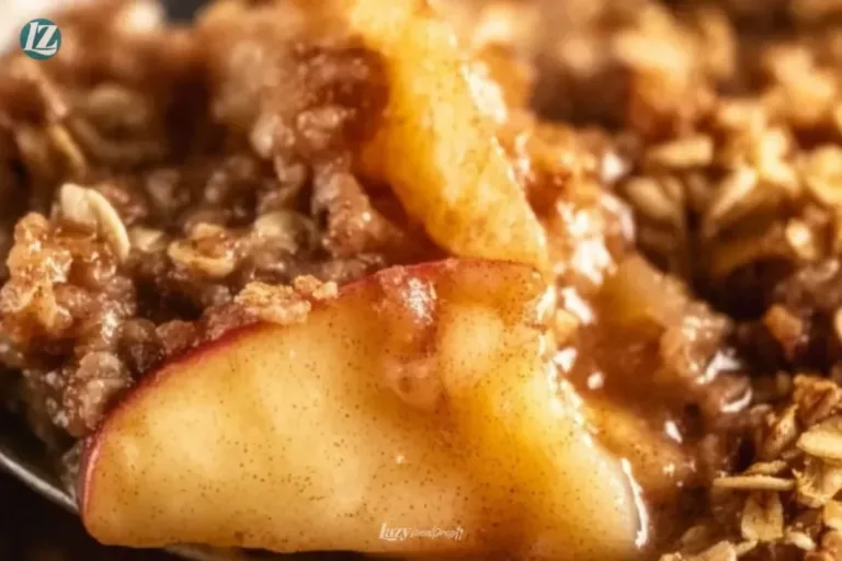 Baked easy apple crisp served with a scoop of vanilla ice cream.