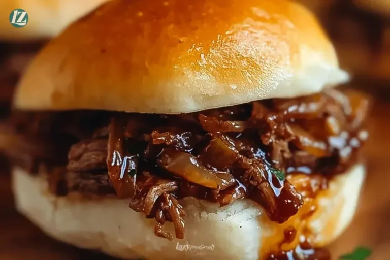 Delicious plate of French Onion Beef Sloppy Joes served with toppings.