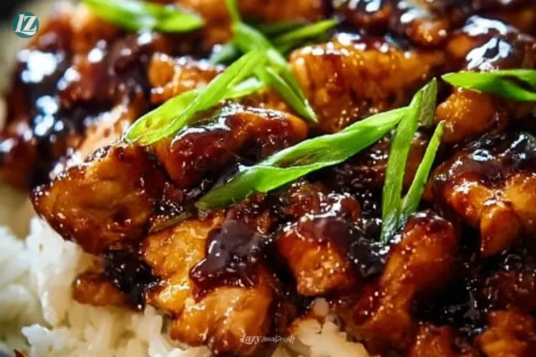 Delicious Honey BBQ Chicken served over rice in a vibrant bowl