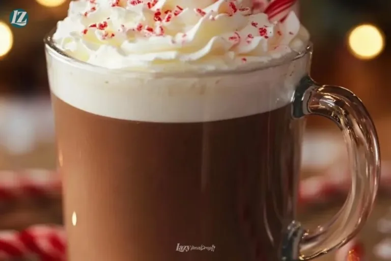 Delicious peppermint hot cocoa topped with whipped cream and peppermint flakes