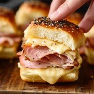 Delicious ham and cheese sliders served on a platter
