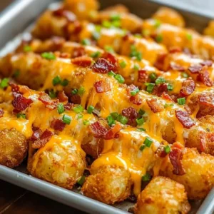 Delicious loaded tater tot skewers topped with cheese and bacon
