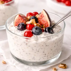 Delicious kefir overnight oats topped with fresh fruits and nuts.
