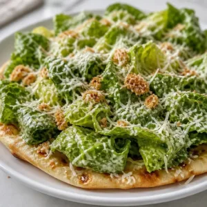 Delicious Smash Chicken Caesar Tacos served on a wooden platter